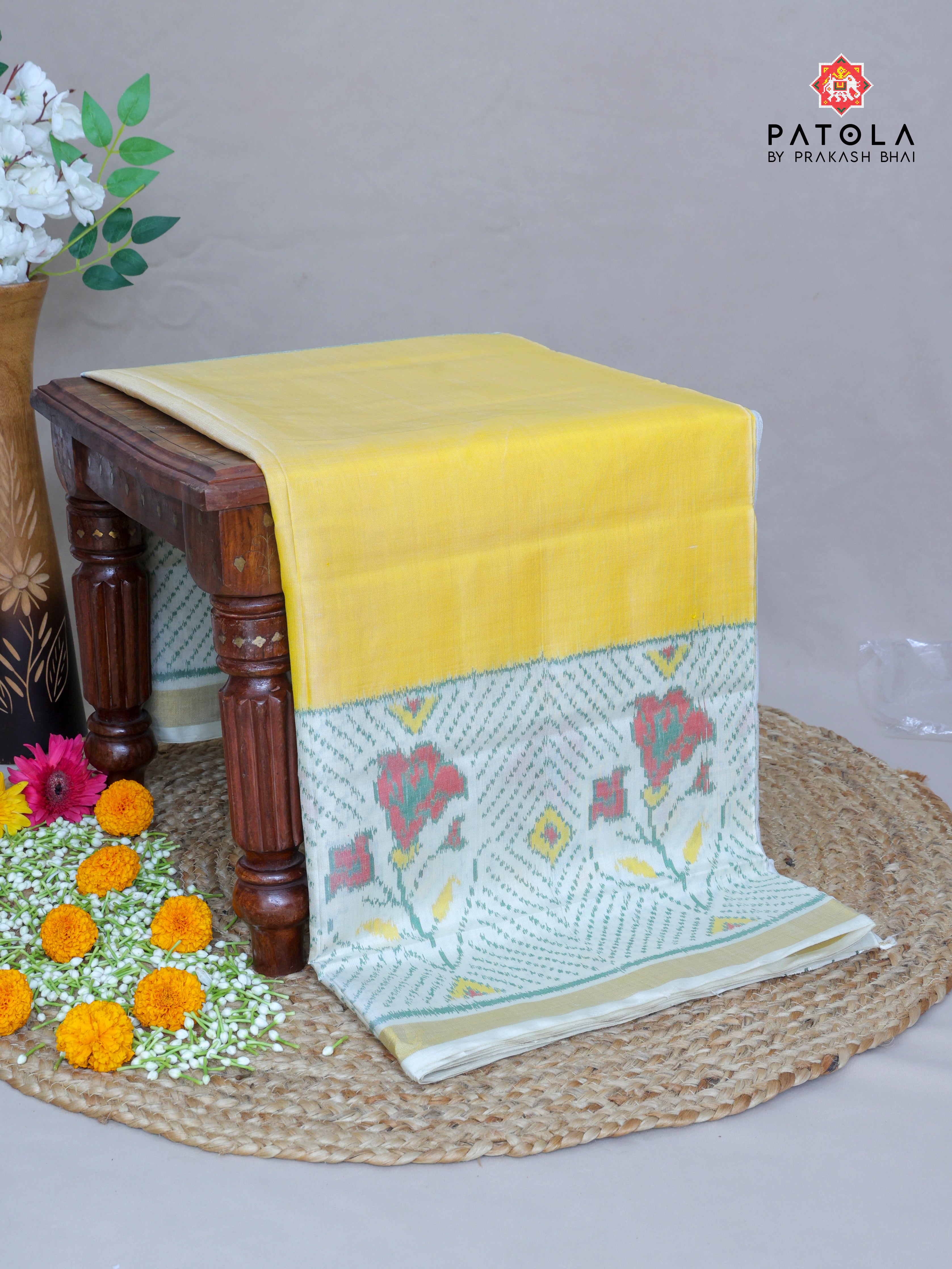 Plain Yellow With Rose Scut Border Single Ikat Patola Saree